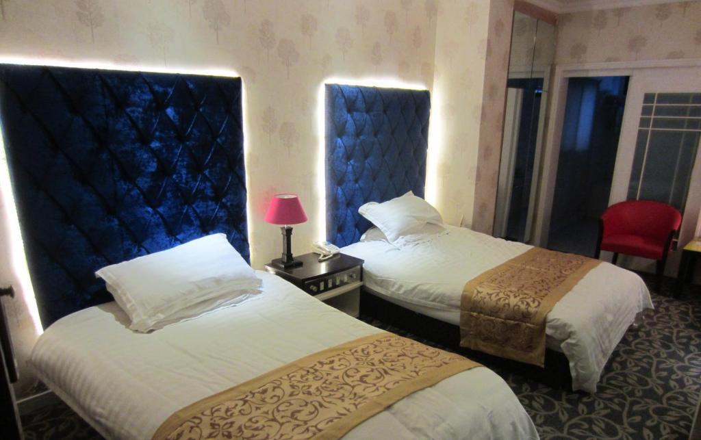 Jiujiu Holiday Hotel Шанхай Номер фото