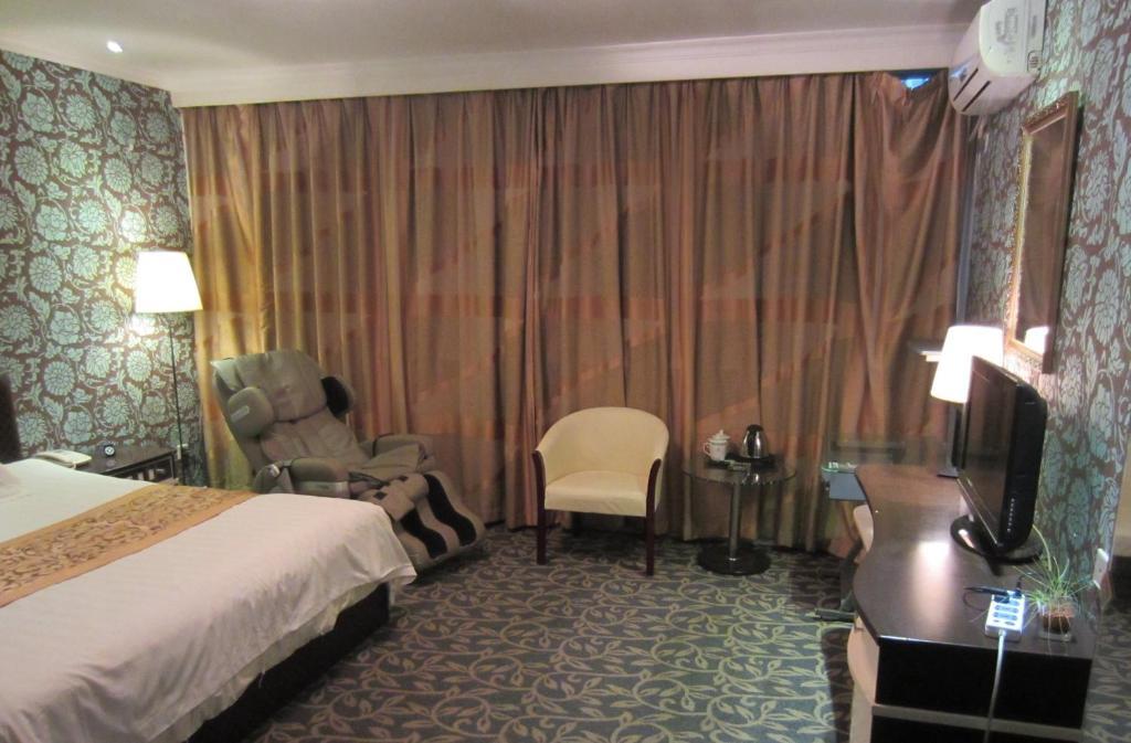 Jiujiu Holiday Hotel Шанхай Номер фото